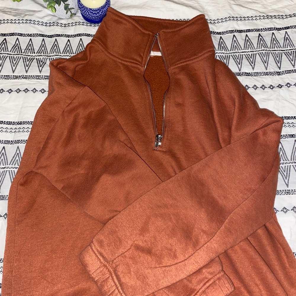 Pullover top in color copper by Entro size small